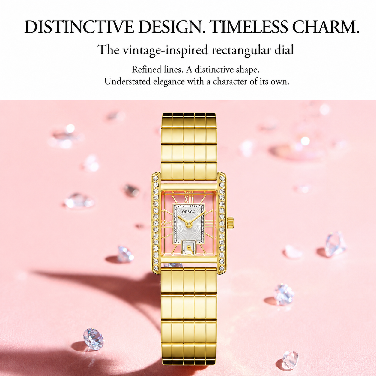 A gold-tone rectangular wristwatch with a pink dial and rhinestone accents, displayed on a pink background with scattered diamond props. Text at the top reads 'DISTINCTIVE DESIGN.